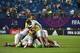 Uruguay's players celebrate winning their U-20 World Cup quarter-final football match against Portugal in Daejeon on June 4, 2017. / AFP PHOTO / KIM DOO-HO (Photo credit should read KIM DOO-HO/AFP/Getty Images)