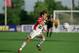 17 Jun 2001: Mandy Clemens #22 of the Philadelphia Charge runs with the ball during the WUSA game against the New York Power at Mitchell Field in Uniondale, New York. The Power defeated the Charge 2-1.Mandatory Credit: Rick Stewart /Allsport