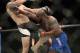 Derrick Lewis (right) punches Travis Browne