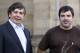 Professor Andre Geim, left, and Dr. Konstantin Novoselov are seen outside Manchester University