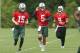 New York Jets quarterbacks Josh McCown (15), Christian Hackenberg (5) and Bryce Petty (9)