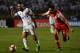 Lucas Lima (L) of Brazils Santos, vies for the ball with Jose Moya (R) of Colombias Santa Fe, during their 2017 Copa Libertadores football match held at Pacaembu stadium, in Sao Paulo, Brazil, on May 4, 2017. / AFP PHOTO / NELSON ALMEIDA (Photo cre