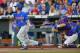 OMAHA, NE - JUNE 26: Third basemen Jonathan India #6 of the Florida Gators hits a two run double against the LSU Tigers in the third inning during game one of the College World Series Championship Series on June 26, 2017 at TD Ameritrade Park in Omaha, N