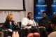 Dr. Jocelyn Benson, Michael Bennett and Brandon Marshall at a RISE event during Super Bowl week.