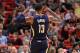 MIAMI, FL - DECEMBER 14: Paul George #13 of the Indiana Pacers reacts to a three pointer during a game against the Miami Heat at American Airlines Arena on December 14, 2016 in Miami, Florida. NOTE TO USER: User expressly acknowledges and agrees that, by