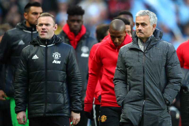 MANCHESTER, ENGLAND - APRIL 27:  Jose Mourinho, Manager of Manchester United and Wayne Rooney of Manchester United make their way to the bench during the Premier League match between Manchester City and Manchester United at Etihad Stadium on April 27, 201