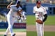 Dodgers closer Kenley Jensen (left) and "Wild Thing" (right), portrayed by Charlie Sheen in "Major League," are responsible for winning games and bringing people to their feet.