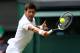 LONDON, ENGLAND - JULY 04: Novak Djokovic of Serbia plays a backhand during the Gentlemen's Singles first round match against Martin Klizan of Slovakia on day two of the Wimbledon Lawn Tennis Championships at the All England Lawn Tennis and Croquet Club