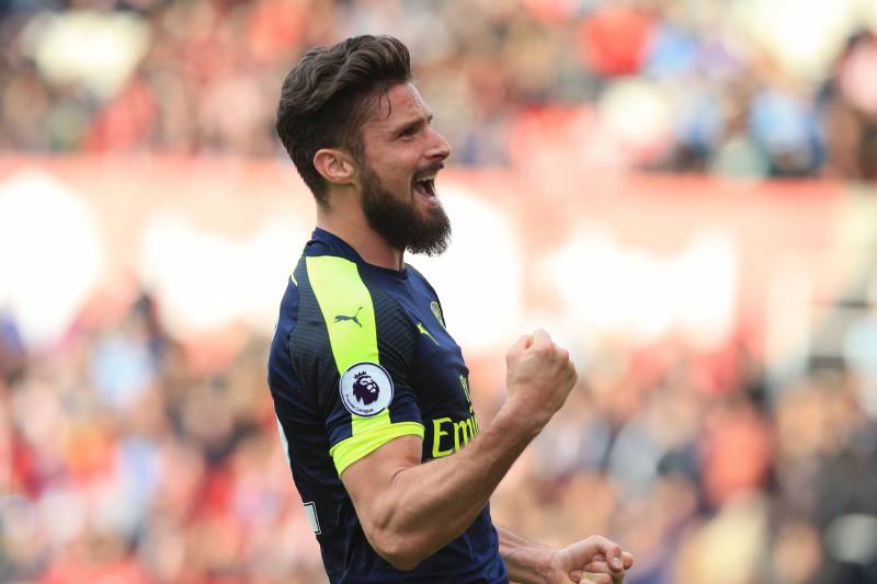Arsenal's French striker Olivier Giroud celebrates after scoring their fourth goal during the English Premier League football match between Stoke City and Arsenal at the Bet365 Stadium in Stoke-on-Trent, central England on May 13, 2017.
Arsenal won the ga