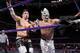 Lince Dorado sends TJP into the corner during a match on 205 Live.