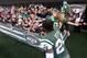 Jan 1, 2017; East Rutherford, NJ, USA; New York Jets corner back Darrelle Revis (24) hands his gloves to a fan as he runs off the field after a game against the Buffalo Bills at MetLife Stadium. Mandatory Credit: Brad Penner-USA TODAY Sports