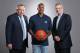 MINNEAPOLIS, MN - JULY 10: Free Agent signee Jeff Teague of the Minnesota Timberwolves poses for portraits with Scott Layden and Tom Thibodeau on July 10, 2017 at the Minnesota Timberwolves and Lynx Courts at Mayo Clinic Square in Minneapolis, Minnesota.