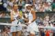 Spain's Garbine Muguruza shakes hands with Slovakia's Magdalena Rybarikova after winning their women's singles semi-final match on the tenth day of the 2017 Wimbledon Championships at The All England Lawn Tennis Club in Wimbledon, southwest London, on Jul