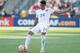 U.S. national team midfielder Joe Corona is one of many players who have found themselves torn between playing for the United States or Mexico.