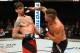 GLASGOW, SCOTLAND - JULY 16: (R-L) Jack Marshman of Wales punches Ryan Janes of Canada in their middleweight bout during the UFC Fight Night event at the SSE Hydro Arena Glasgow on July 16, 2017 in Glasgow, Scotland. (Photo by Josh Hedges/Zuffa LLC/Zuffa
