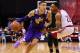 Jul 13, 2017; Las Vegas, NV, USA; Los Angeles Lakers forward Kyle Kuzma (0) dribbles around Cleveland Cavaliers forward Malcom Thomas (28) during an NBA Summer League game at Thomas & Mack Center. Mandatory Credit: Stephen R. Sylvanie-USA TODAY Sportss