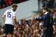 LONDON, ENGLAND - APRIL 15: Mauricio Pochettino, Manager of Tottenham Hotspur (R) speaks to Eric Dier of Tottenham Hotspur (L) during the Premier League match between Tottenham Hotspur and AFC Bournemouth at White Hart Lane on April 15, 2017 in London, En