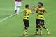 GUANGZHOU, CHINA - JULY 18: #17 Pierre-Emerick Aubameyang(R-2) of Dortmund celebrates his goal with teammates during the 2017 International Champions Cup football match between AC Milan and Borussia Dortmund at University Town Sports Centre Stadium on Ju