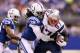 INDIANAPOLIS, IN - NOVEMBER 16: Sergio Brown #38 of the Indianapolis Colts tackles Rob Gronkowski #87 of the New England Patriots during the third quarter of the game at Lucas Oil Stadium on November 16, 2014 in Indianapolis, Indiana. (Photo by Andy Lyo