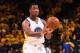 OAKLAND, CA - APRIL 19: Damian Jones #15 of the Golden State Warriors passes the ball against the Portland Trail Blazers during Game Two of the Western Conference Quarterfinals during the 2017 NBA Playoffs on April 19, 2017 at ORACLE Arena in Oakland, Ca