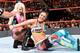 Alexa Bliss in control of Bayley in a match on Raw.