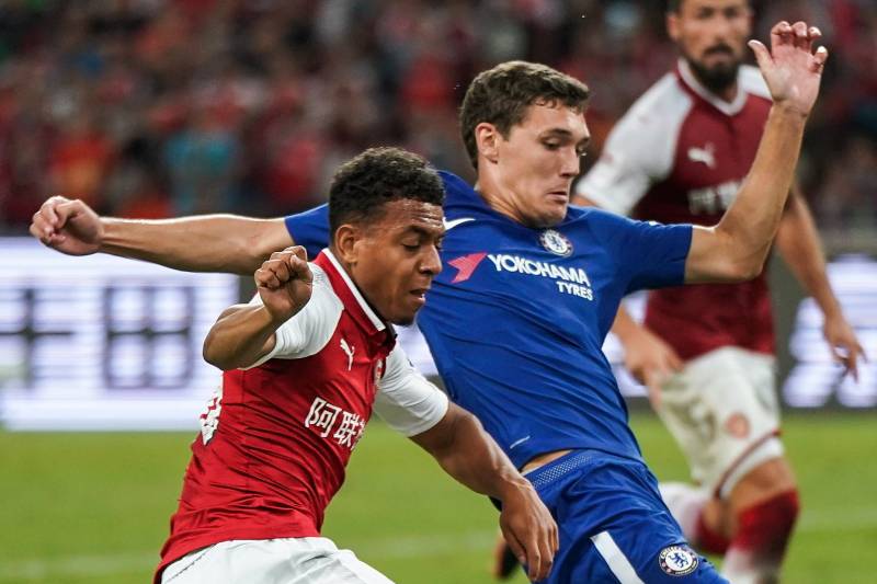 BEIJING, CHINA - JULY 22:  Donyell Malen of Arsenal takes a shot against Andreas Christensen of Chelsea during the Pre-Season Friendly match between Arsenal FC and Chelsea FC at Birds Nest on July 22, 2017 in Beijing, China.  (Photo by Yifan Ding/Getty Im