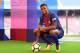 Barcelona's new player Portuguesse Nelson Semedo poses with his new jersey and a ball during his official presentation, after signing his new contract with the Catalan club at the Camp Nou stadium in Barcelona on July 14, 2017. / AFP PHOTO / LLUIS GENE