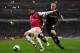 Arsenal's Brazilian midfielder Denilson (L) vies with Leyton Orient's Republic of Ireland midfielder Stephen Dawson (R) during their FA Cup fifth round replay football match against Leyton Orient at the Emirates Stadium, London, England, on March 2, 2011.