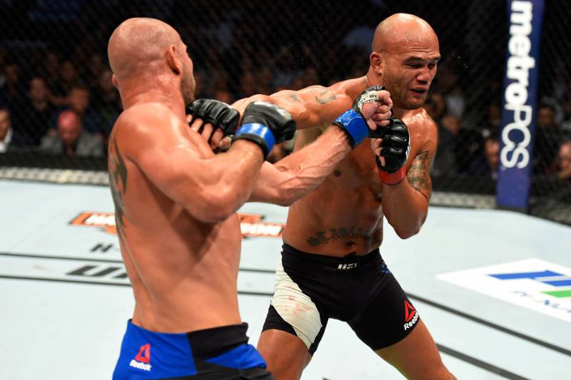 ANAHEIM, CA - JULY 29: Robbie Lawler and Donald Cerrone trade punches in their welterweight bout during the UFC 214 event at Honda Center on July 29, 2017 in Anaheim, California. (Photo by Josh Hedges/Zuffa LLC/Zuffa LLC via Getty Images)