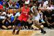 DALLAS, TX - JULY 30: Al Harrington #3 of Trilogy dribbles the ball while being guarded by Ivan Johnson #44 of the Ghost Ballers during week six of the BIG3 three on three basketball league at American Airlines Center on July 30, 2017 in Dallas, Texas.
