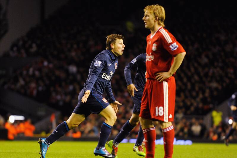 LIVERPOOL, ENGLAND - DECEMBER 13: Andrey Arshavin of Arsenal celebrates scoring his team's second goal during the Barclays Premier League match between Liverpool and Arsenal at Anfield on December 13, 2009 in Liverpool, England. (Photo by Michael Regan