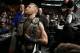 McGregor leaves the cage after winning his second UFC title.