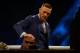McGregor rubs Mayweather's head (for luck?) during their press tour.