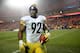 KANSAS CITY, MP - JANUARY 15: Outside linebacker James Harrison #92 of the Pittsburgh Steelers walks off of the field with a Sunday Night Football game ball following the Steelers victory over the Kansas City Chiefs in the AFC Divisional Playoff game at A