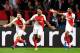 Monaco's French forward Kylian Mbappe Lottin (C) celebrates with Monaco's Portuguese midfielder Bernardo Silva (L) and Monaco's French midfielder Thomas Lemar (R) after scoring a goal during the UEFA Champions League round of 16 football match between Mon