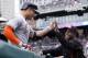 Bonds briefly coached the Marlins' Giancarlo Stanton, one of the players with the potential to surpass his home run total.
