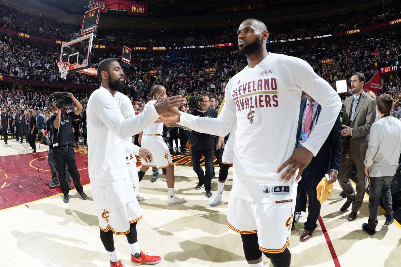 CLEVELAND, OH - JUNE 9: Kyrie Irving #2 and LeBron James #23 of the Cleveland Cavaliers celebrate after Game Four of the 2017 NBA Finals on June 9, 2017 at Quicken Loans Arena in Cleveland, Ohio. NOTE TO USER: User expressly acknowledges and agrees that,