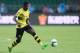 GUANGZHOU, CHINA - JULY 18: #7 Ousmane Dembele of Dortmund in action during the 2017 International Champions Cup football match between AC Milan and Borussia Dortmund at University Town Sports Centre Stadium on July 18, 2017 in Guangzhou, China. (Photo