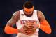 Apr 6, 2017; New York, NY, USA; New York Knicks small forward Carmelo Anthony (7) inspects the ball before a game against the Washington Wizards at Madison Square Garden. Mandatory Credit: Brad Penner-USA TODAY Sports