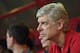 Arsenal coach Arsene Wenger looks on before the start of their pre-season football match against Chelsea in Beijing's National stadium, known as the Bird's Nest, on July 22, 2017. / AFP PHOTO / GREG BAKER (Photo credit should read GREG BAKER/AFP/Ge