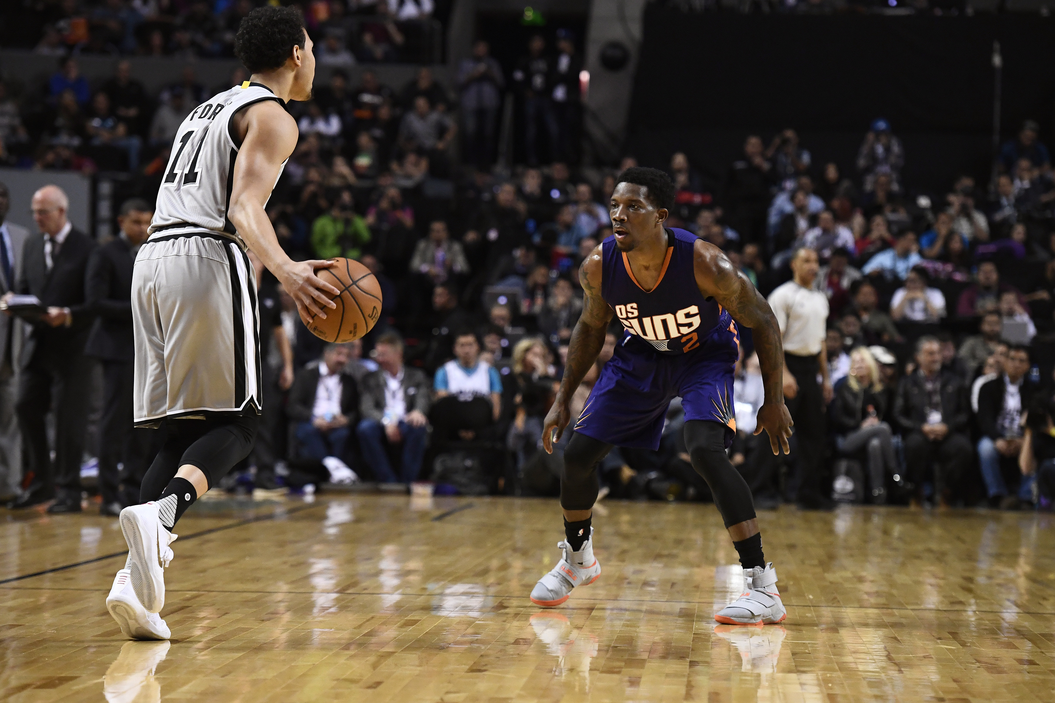 MEXICO CITY, MEXICO - JANUARY 14: Eric Bledsoe #2 of the Phoenix Suns plays defense against Bryn Forbes #11 of the San Antonio Spurs as part of NBA Global Games at Arena Ciudad de Mexico on January 14, 2017 in Mexico City, Mexico. NOTE TO USER: User expr