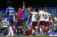 Chelsea's English defender Gary Cahill (C) is shown a red card by English referee Craig Pawson after a foul on Burnley's Belgian midfielder Steven Defour during the English Premier League football match between Chelsea and Burnley at Stamford Bridge in Lo