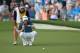CHARLOTTE, NC - AUGUST 12: Justin Thomas of the United States lines up a putt on the 18th green during the third round of the 2017 PGA Championship at Quail Hollow Club on August 12, 2017 in Charlotte, North Carolina. (Photo by Mike Ehrmann/Getty Images