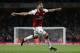 Arsenal's French striker Olivier Giroud celebrates scoring Arsenal's fourth goal during the English Premier League football match between Arsenal and Leicester City at the Emirates Stadium in London on August 11, 2017.
Arsenal won the game 4-3. / AFP PHOT