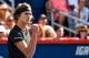 MONTREAL, QC - AUGUST 13: Alexander Zverev of Germany reacts after scoring a point against Roger Federer of Switzerland during day ten of the Rogers Cup presented by National Bank at Uniprix Stadium on August 13, 2017 in Montreal, Quebec, Canada. (Photo