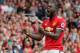 MANCHESTER, ENGLAND - AUGUST 13: Romelu Lukaku of Manchester United celebrates after scoring a goal to make it 1-0 during the Premier League match between Manchester United and West Ham United at Old Trafford on August 13, 2017 in Manchester, England. (Ph