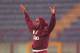 14 SEP 1994: DALIAN ATKINSON OF ASTON VILLA TAKES SHELTER DURING A THUNDERSTORM AT THE SAN SIRO STADIUM IN MILAN BEORE TOMORROWS UEFA CUP FIRST LEG TIE WITH INTER MILAN. Mandatory Credit: Mike Hewitt/ALLSPORT