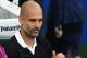 Manchester City's Spanish manager Pep Guardiola awaits kickoff in the English Premier League football match between Brighton and Hove Albion and Manchester City at the American Express Community Stadium in Brighton, southern England on August 12, 2017. /