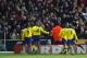 PORTSMOUTH, UNITED KINGDOM: Arsenal's Thierry Henry (14) celebrates with fans and fellow players after scoring against Portsmouth during their FA Cup Quarter Final football match in Portsmouth, 06 March 2004. Arsenal won 5-1. AFP PHOTO/ Martyn HAYHOW