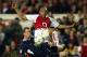 LONDON, UNITED KINGDOM: Arsenal's French forward Thierry Henry (R) shoots past Steven Caldwell of Leeds during their premier league clash at Highbury in London, 16 April 2004. Arsenal defeated Leeds 5-0 with Henry scoring 4.AFP PHOTO / ODD ANDERSEN